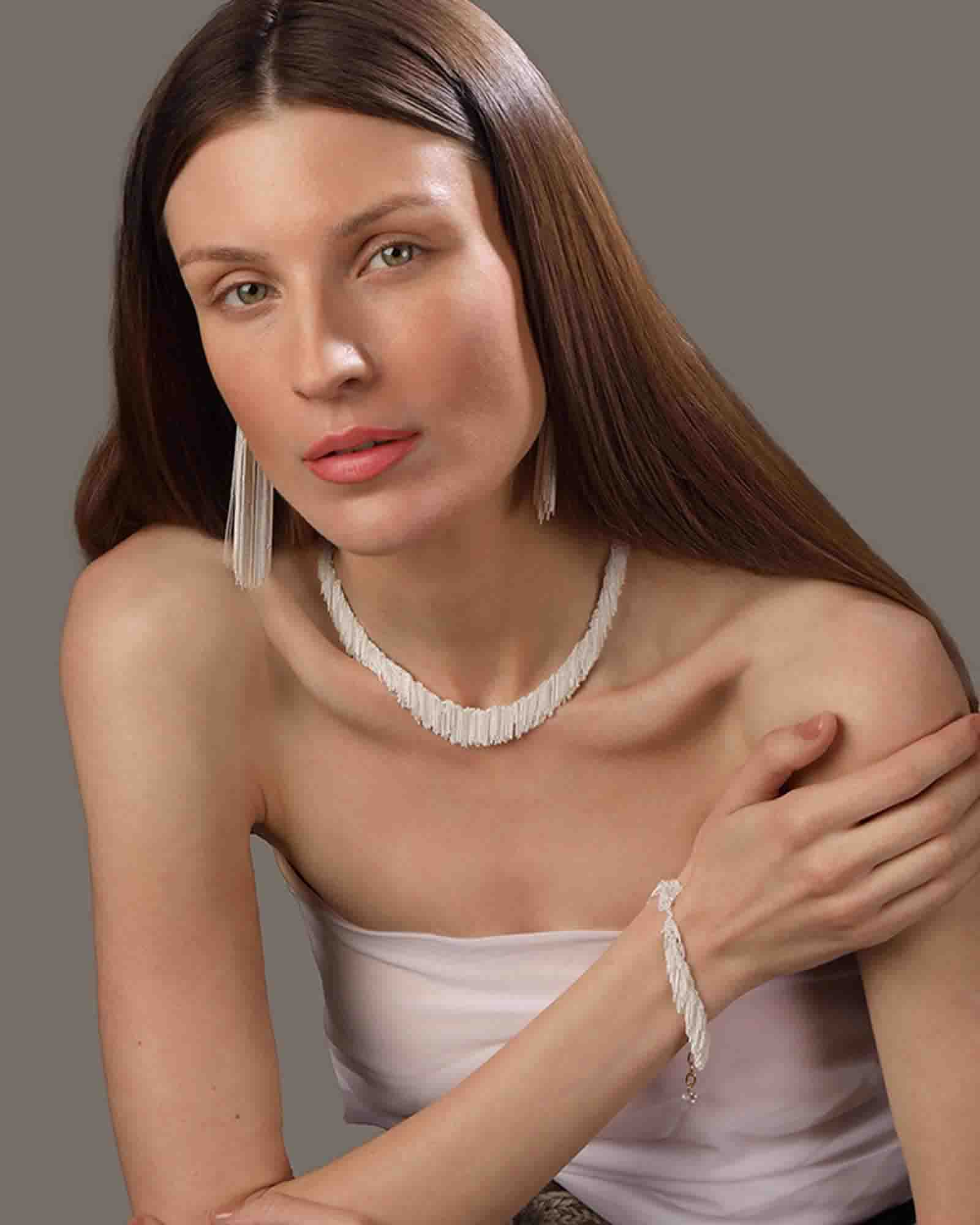 Parisian designed necklace handcrafted with European white strings