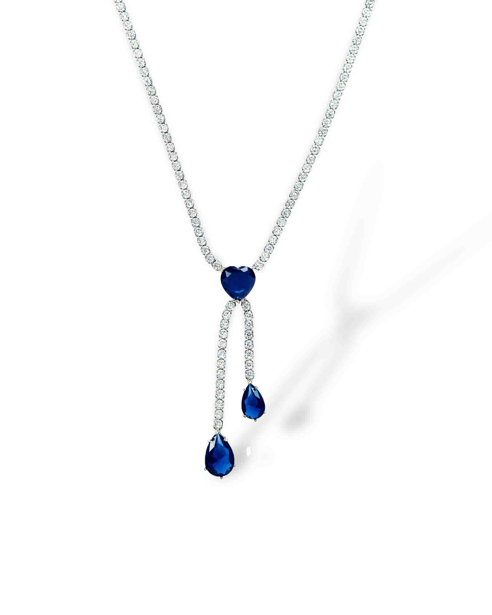 Zircon diamond encrusted blue sapphire crystal set